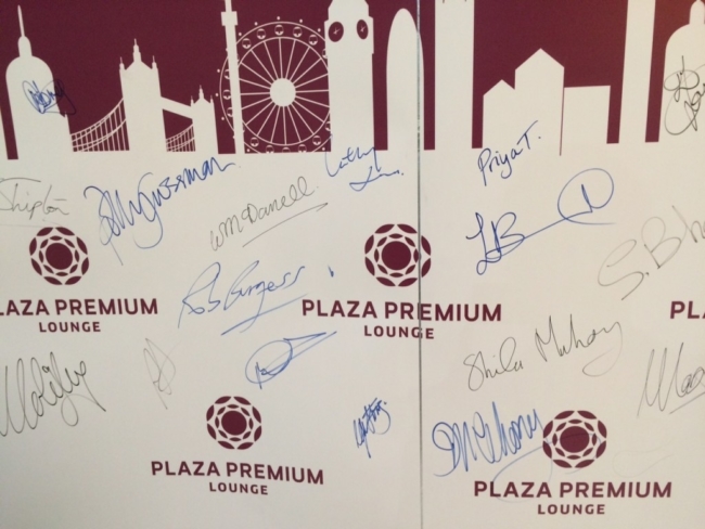 Plaza Premium arrivals guest wall