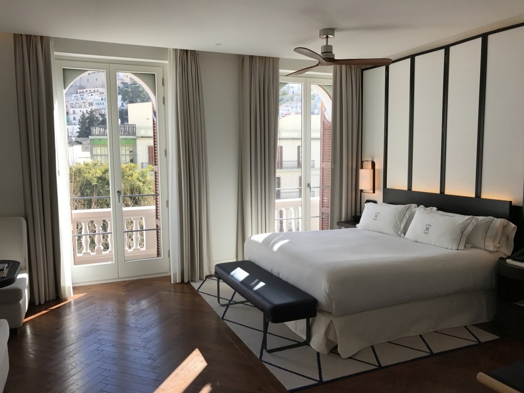 Gran Hotel Montesol Curio Hilton Ibiza bed open curtains