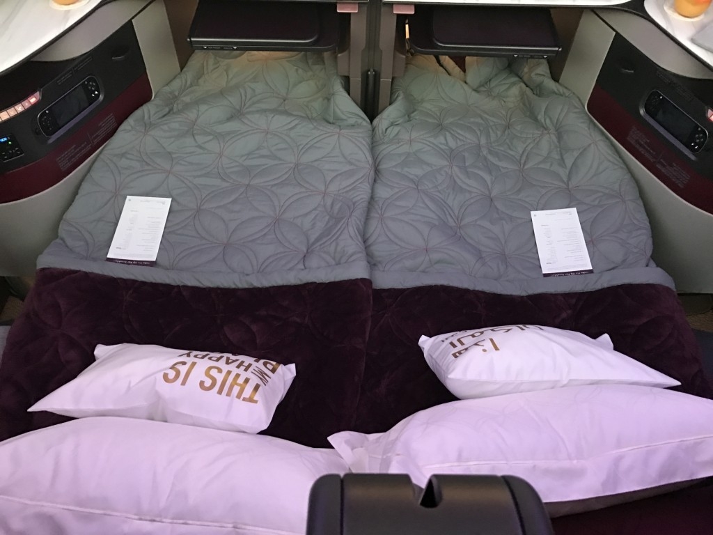 qatar airways new business class seat bed