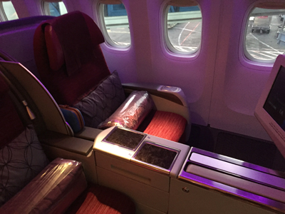 business class flight from Bali to Doha with Qatar Airways