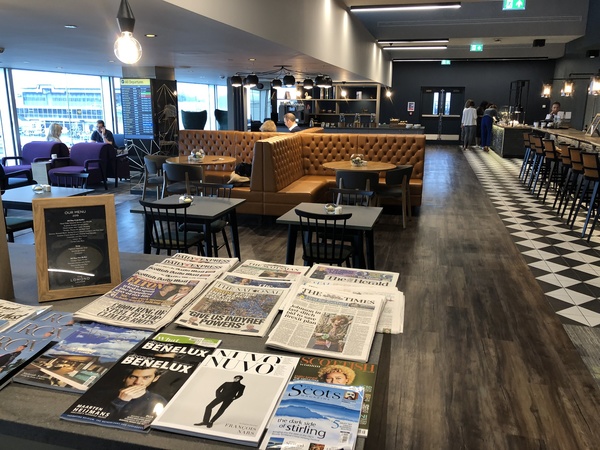 Lomond Lounge Glasgow Airport newspapers