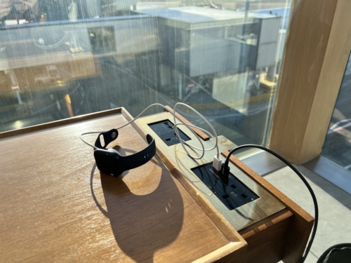 Cathay Pacific First lounge Heathrow charging plugs